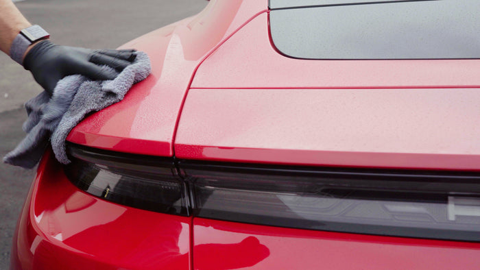 Before it dries, switch to a clean, dry microfiber and buff off any remaining haze.