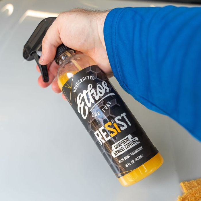 Two sprays onto the panel or into a fresh microfiber towel. A little goes a long way.