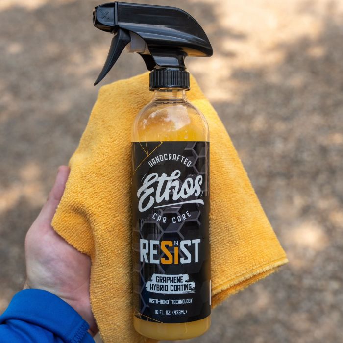 Two sprays onto the panel or into a fresh microfiber towel. A little goes a long way.