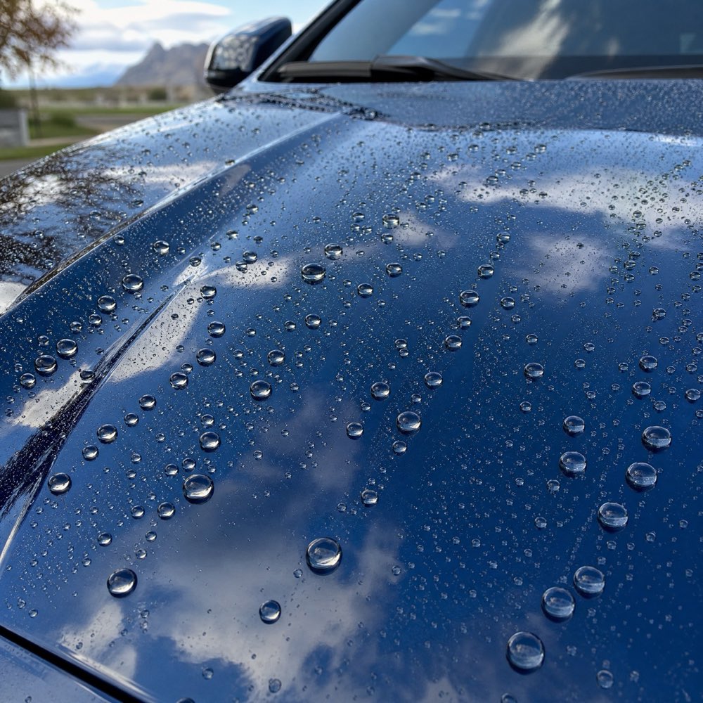 Glossy car hood beading water after one application of RESIST