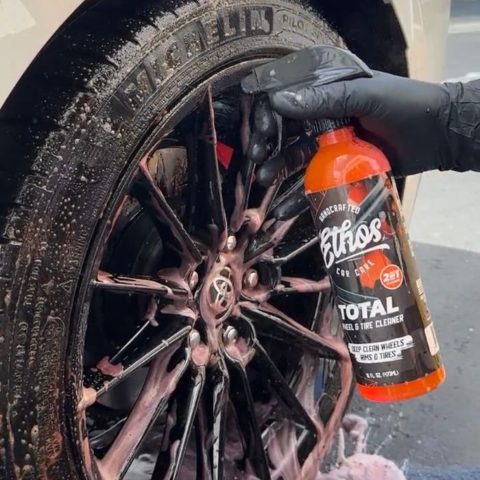 Scrub the tire with TOTAL Tire Cleaner or an all-purpose cleaner, rinse, and let it dry completely.